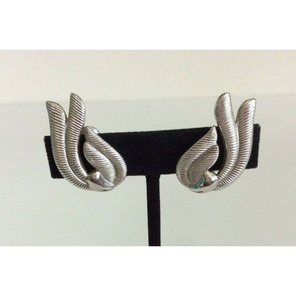 Signed Monet Silver Tone Ribbed Clip On Earrings